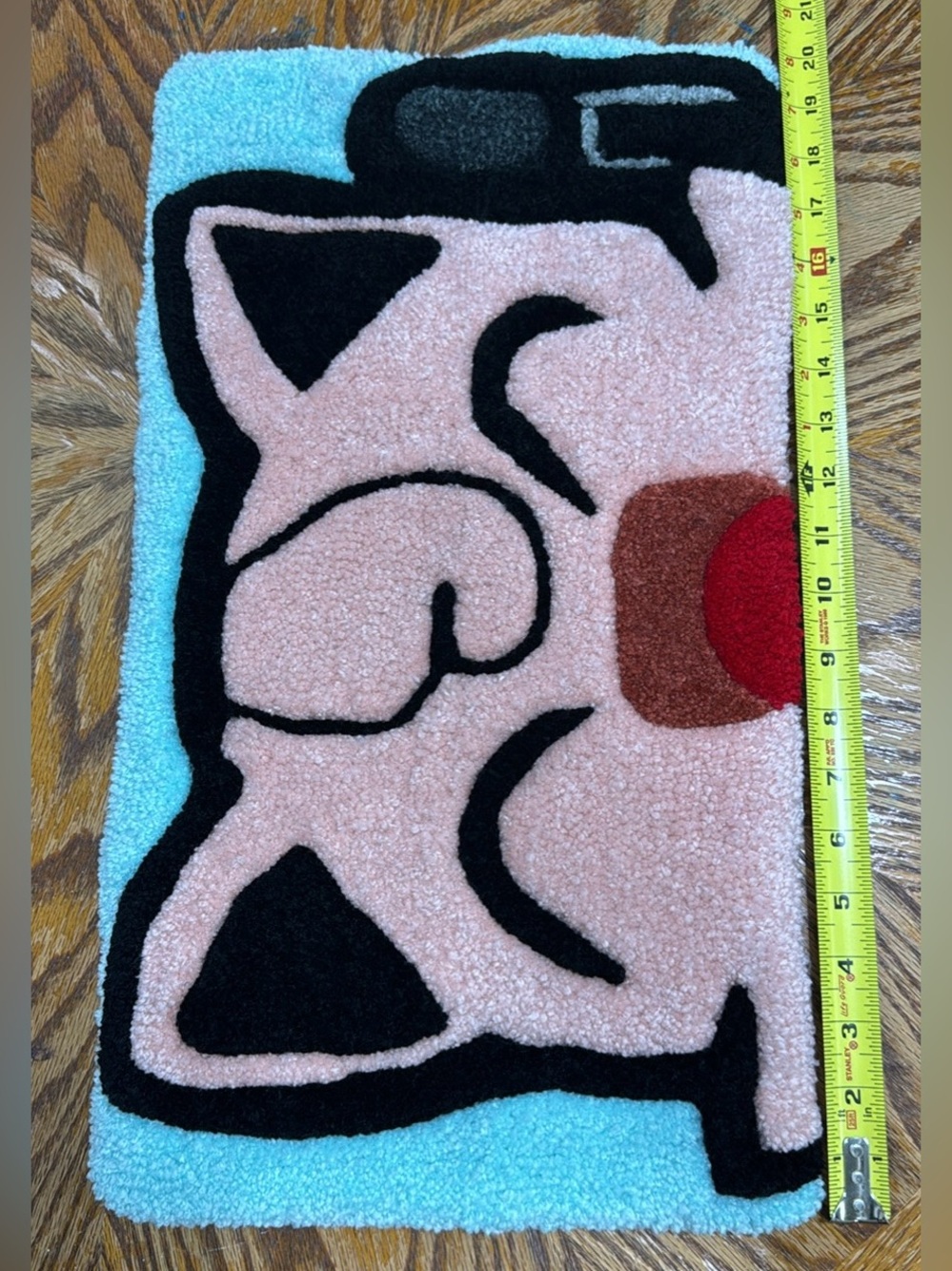 This is a custom-made, Keyboard Wrist Rest Padtufted rug